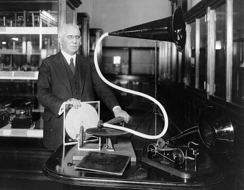 an image showing emile berliner recording on gramophone