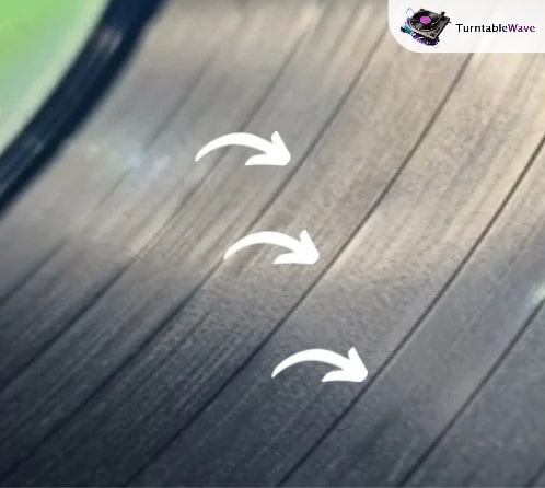 an image showing grooves separator or divider on vinyl record